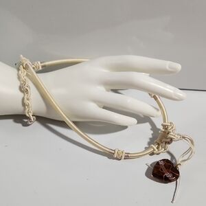 Handmade Knotted Cord Necklace with a Brown Glass Pendant.
